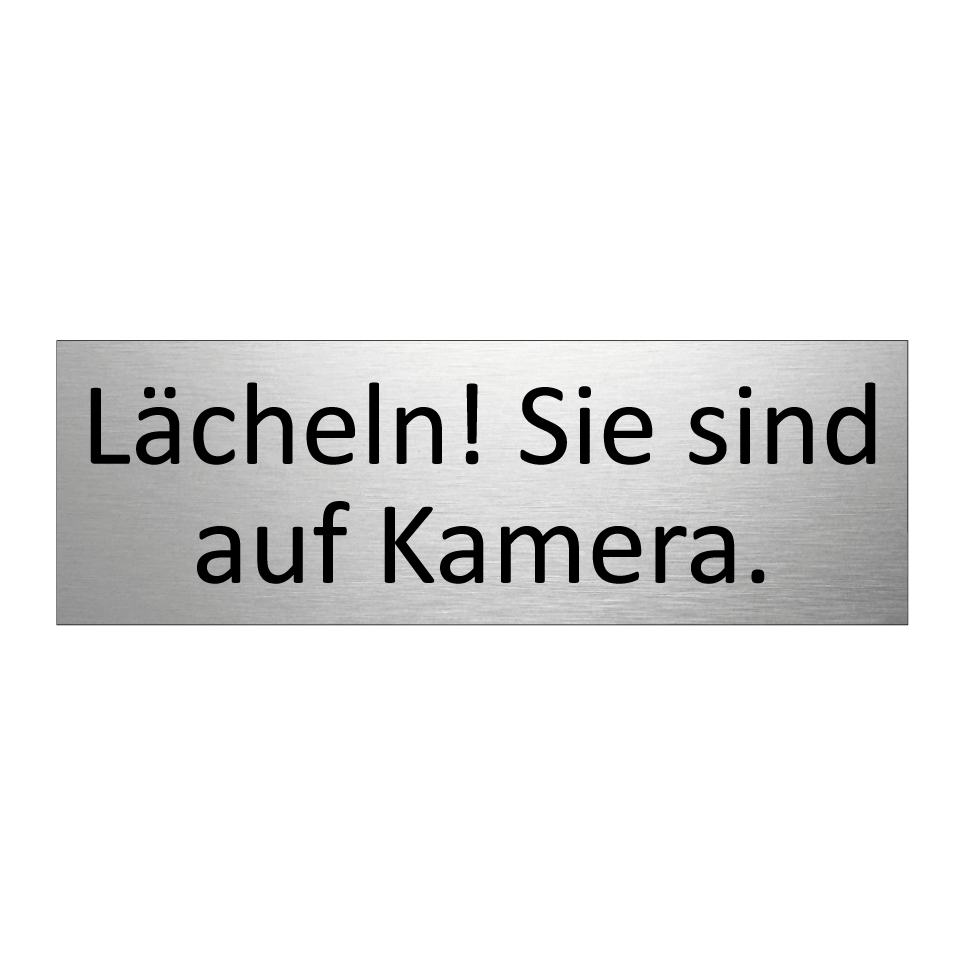 Lächeln! Sie sind auf Kamera.
