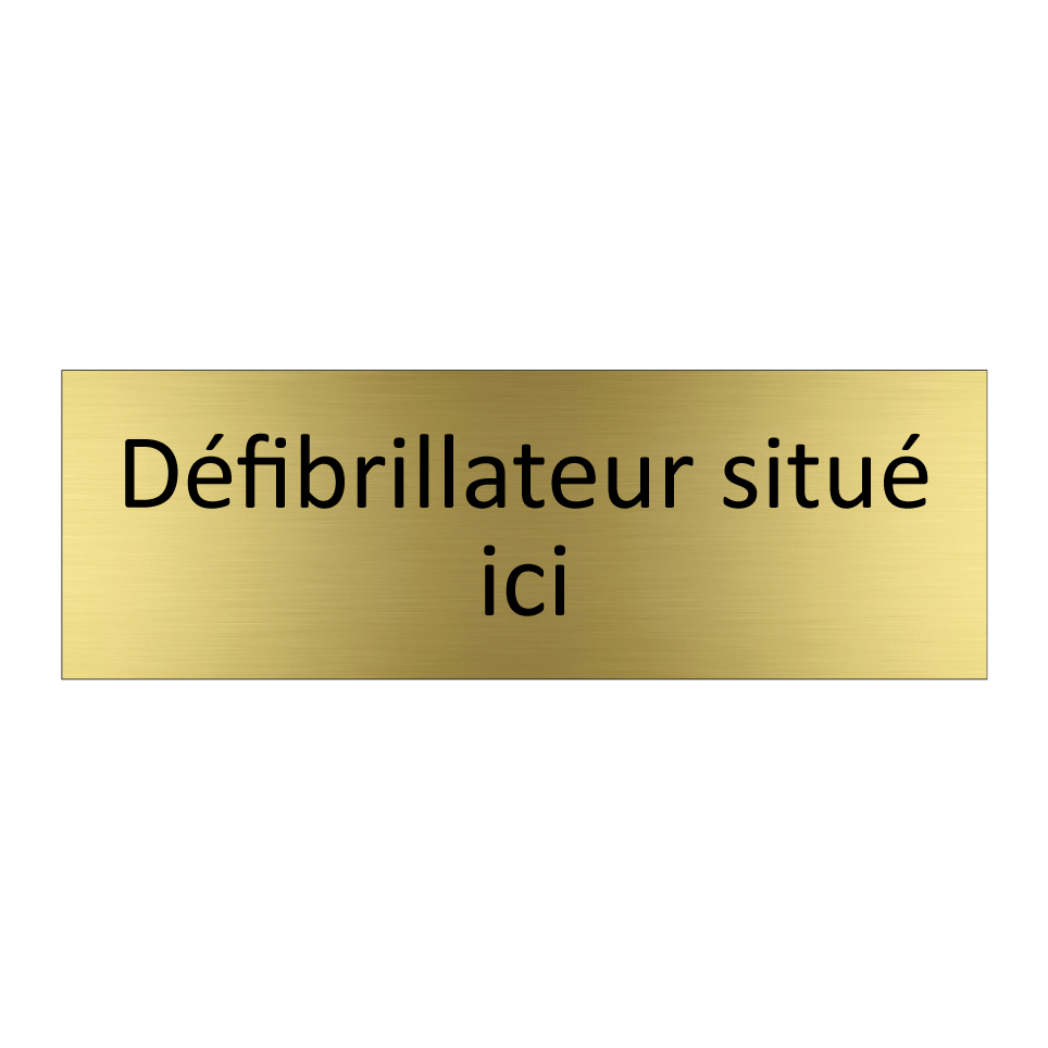 Défibrillateur situé ici