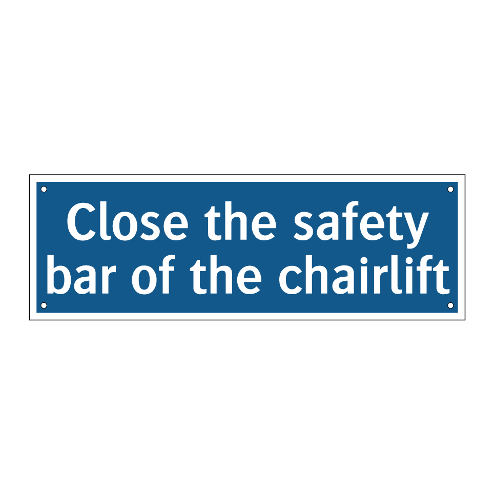 Close the safety bar of the chairlift