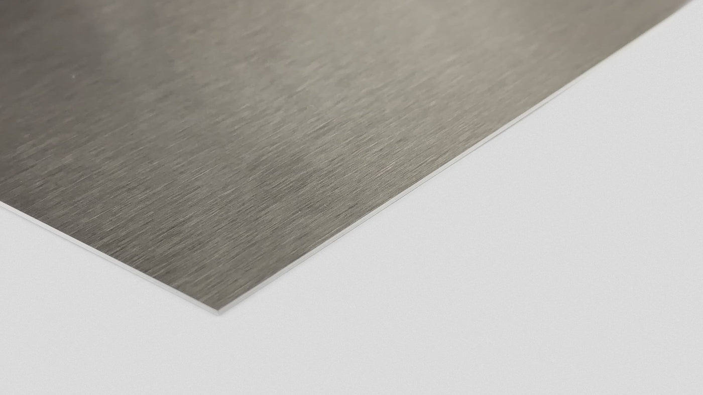 Brushed aluminium sign plate with a directional satin finish